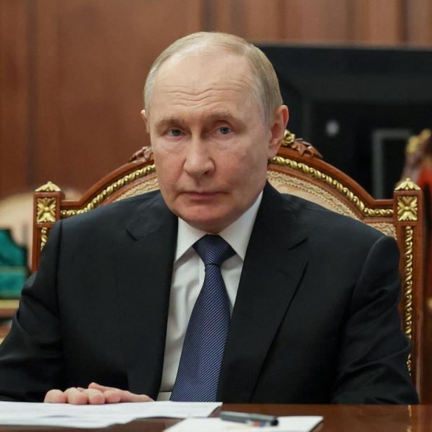Russian President Putin chairs a meeting with members of the government in Moscow