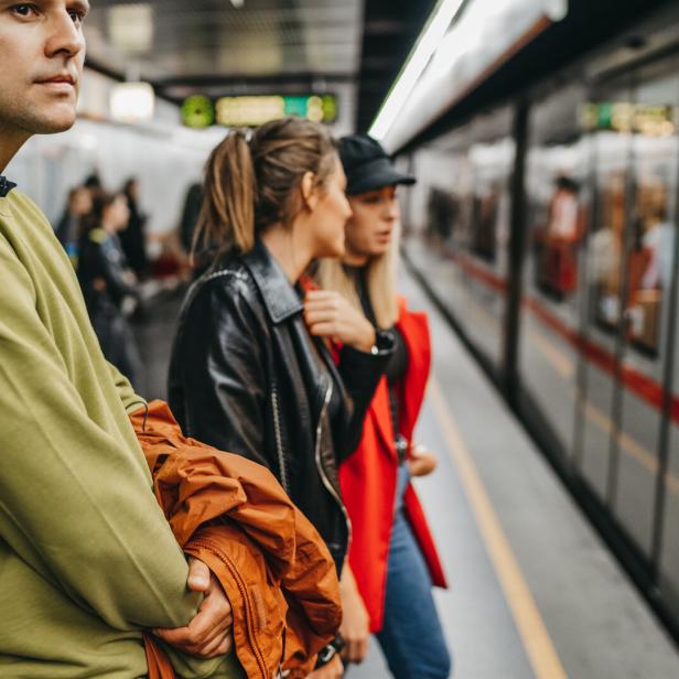 Friends on train station