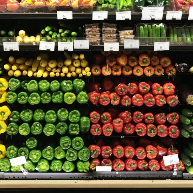 Grocery Market Store Display of Fresh Produce Vegetable in Refrigerator Case