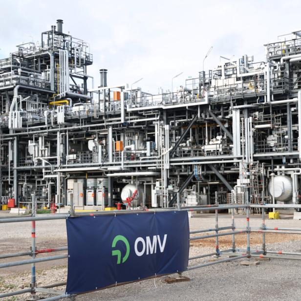 A view of a logo of Austrian oil, gas and chemicals group OMV in front of their ReOil plant in Schwechat,