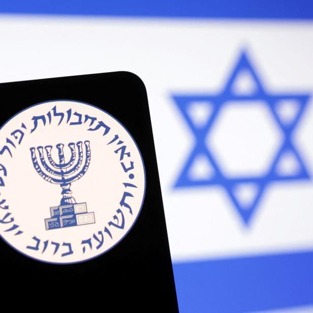 Illustration shows Mossad logo and Israel flag