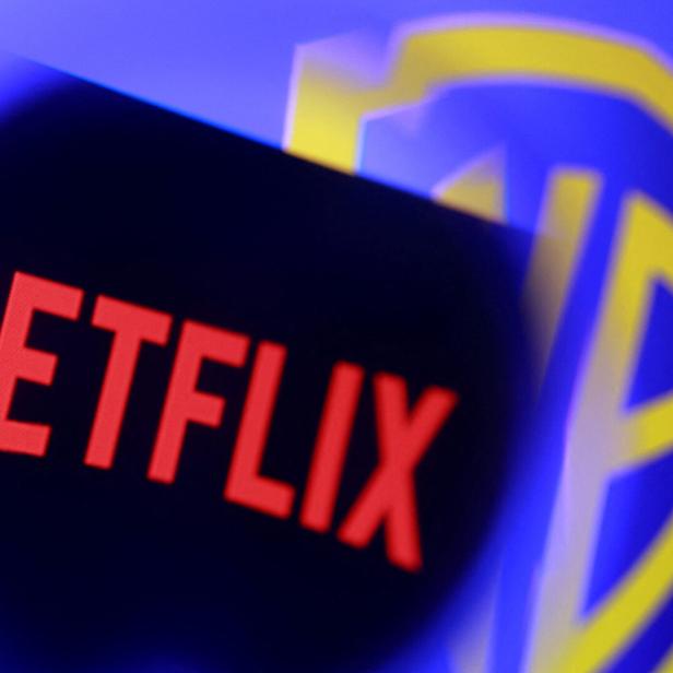 Illustration shows Netflix and Warner Bros logos
