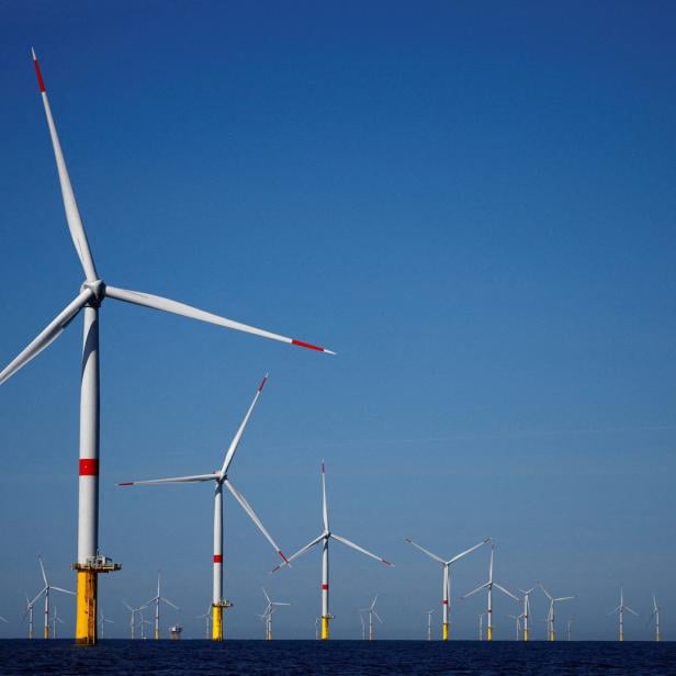 FILE PHOTO: French President Macron visits the Saint-Nazaire offshore wind farm