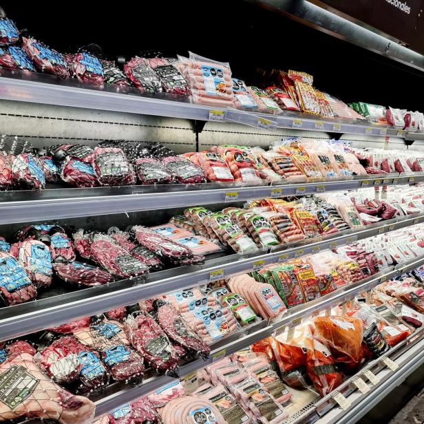 Meat products are displayed for sale in a supermarket in Bogota