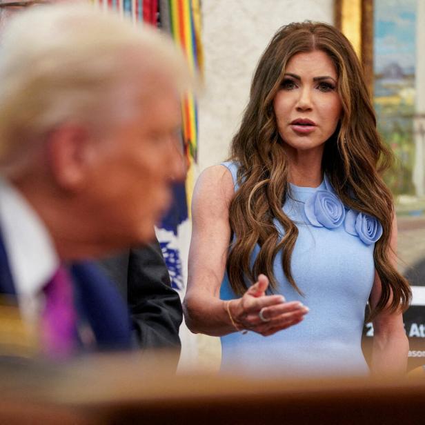 FILE PHOTO: U.S. President Trump and Homeland Security Secretary Kristi Noem at the White House, in Washington