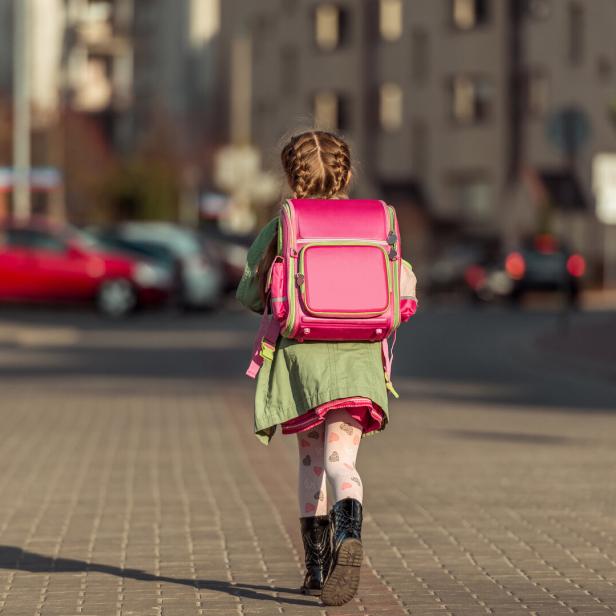 little  girl going to school