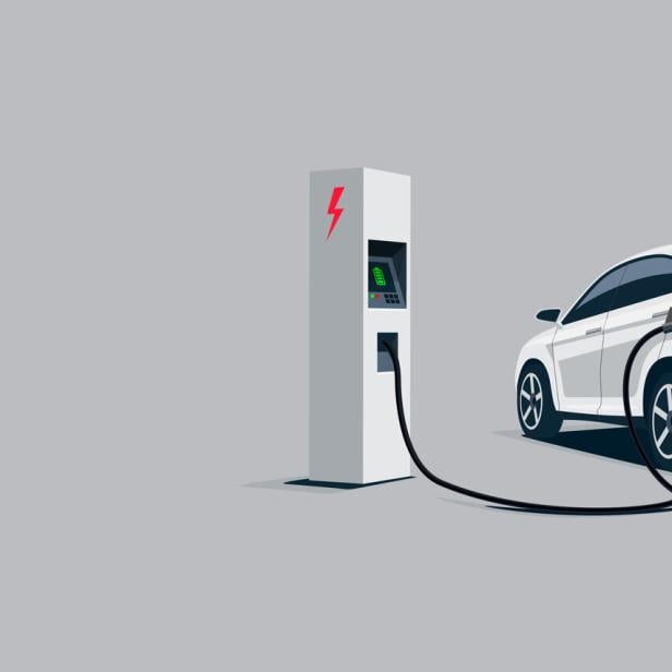 White Electric Car Suv Charging at the Charger Station