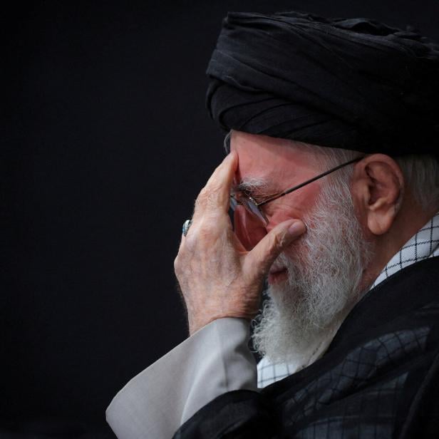 FILE PHOTO: Iran's Supreme Leader Ayatollah Ali Khamenei attends a mourning ceremony for the deaths of Iranian military commanders and scientists, in Tehran