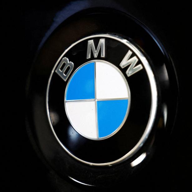 FILE PHOTO: A logo of BMW is seen inside a car dealer in Nijmegen