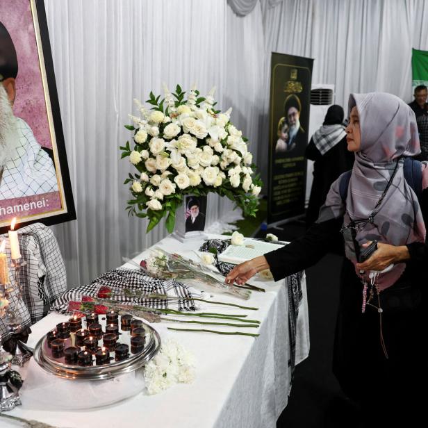 Indonesian Muslims attend prayer for the late Iran's Supreme Leader Ayatollah Ali Khamenei in Jakarta