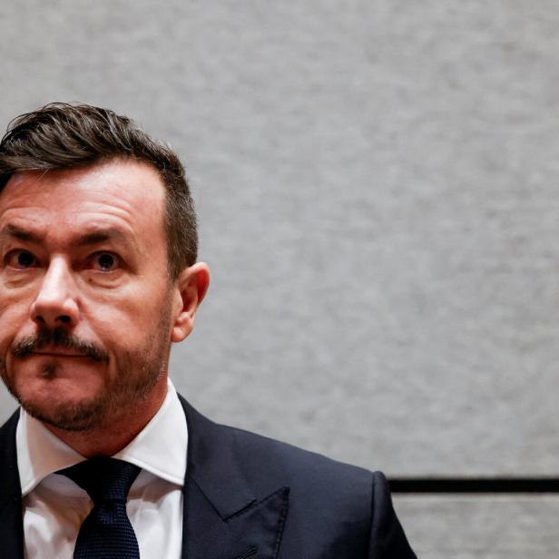 FILE PHOTO: Austrian former property tycoon Rene Benko arrives in the courtroom as a second insolvency fraud trial starts in Innsbruck