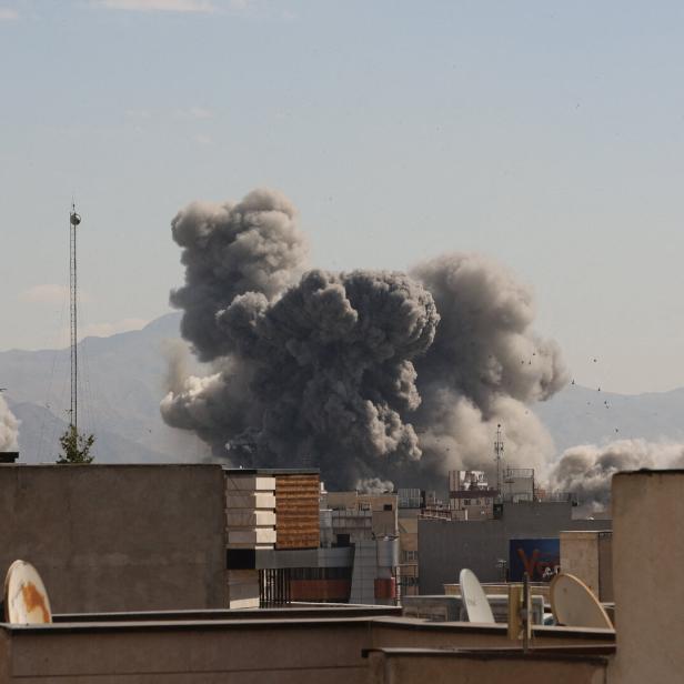 Smoke rises following an explosion, after Israel and the U.S. launched strikes on Iran, in Tehran