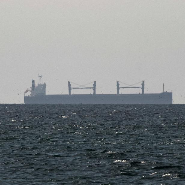 FILE PHOTO: A cargo ship in the Gulf, near the Strait of Hormuz