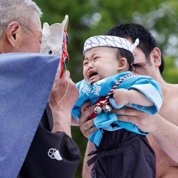Babies take part in 'Nakizumo' or baby crying sumo contest at Senso-ji temple in Tokyo