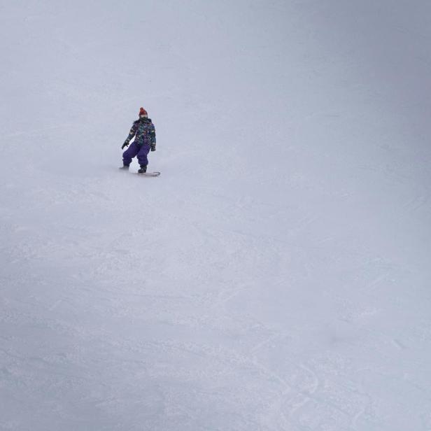 Snowboarder auf der Piste