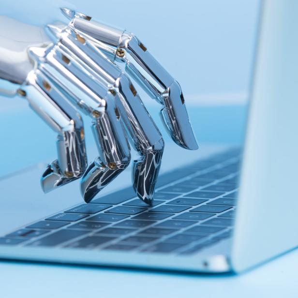 robot hand use notebook work