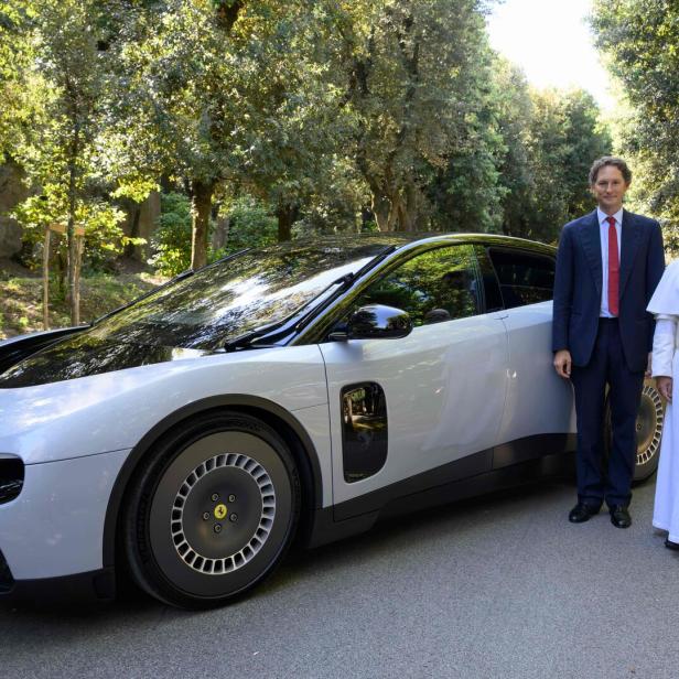 TOPSHOT-ITALY-VATICAN-RELIGION-POPE-AUTOMOBILE-FERRARI-SPORTSCAR