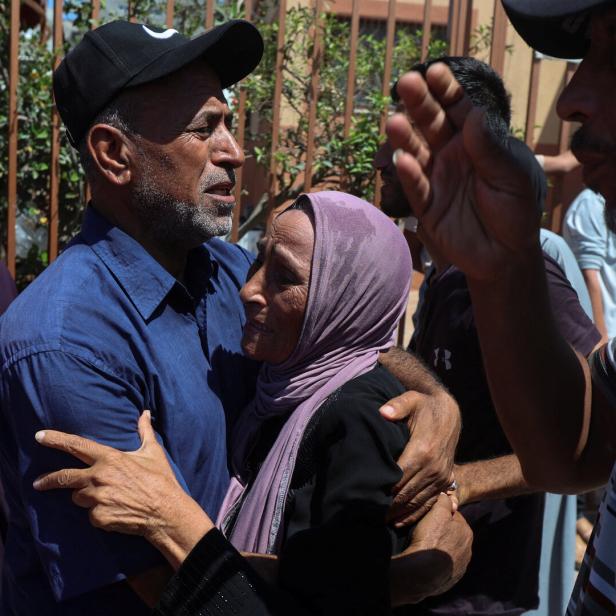 Palestinians mourn loved ones at Nasser hospital following an Israeli strike, in Khan Younis