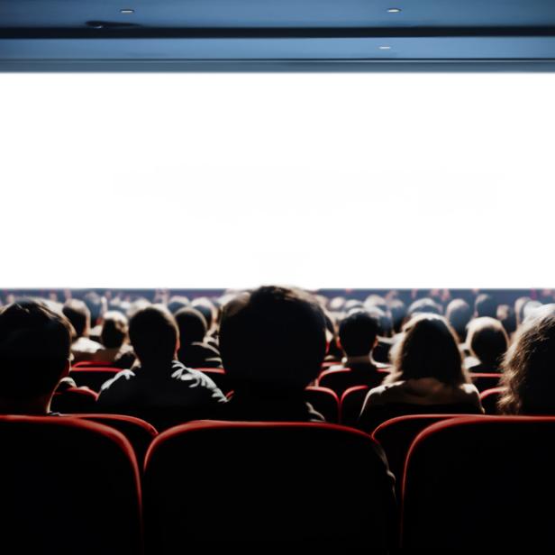 People in the cinema hall with empty white screen.