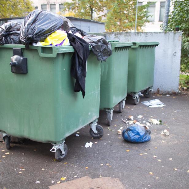 household waste, garbage cans in the city block