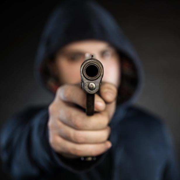 killer with gun
