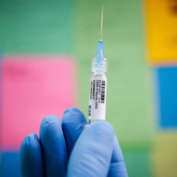 An illustration photo shows a dose of COMIRNATY (COVID-19 Vaccine, mRNA) in Schwenksville