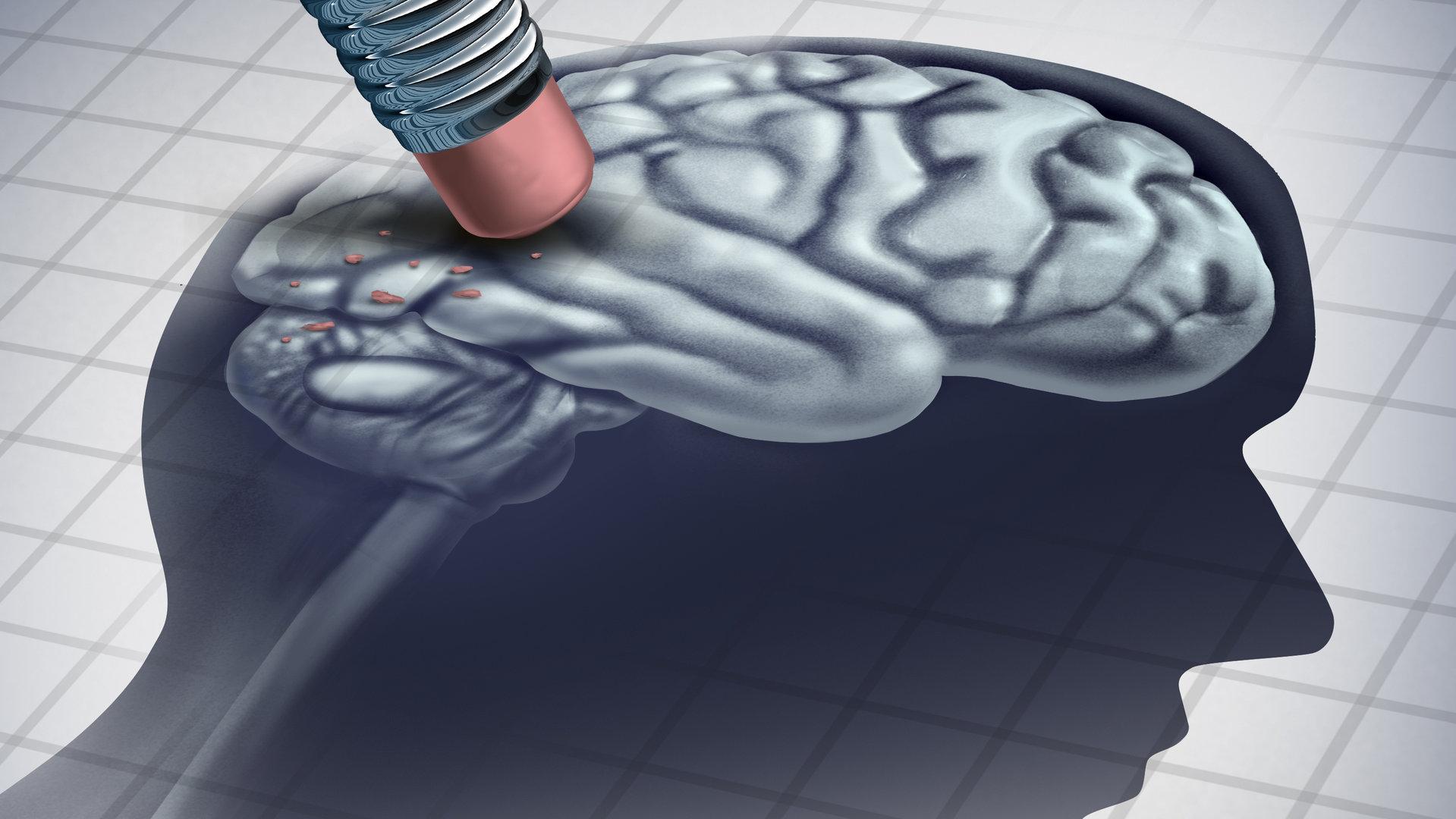 Ein Radiergummi löscht einen Teil des Gehirns in einem menschlichen Kopf.