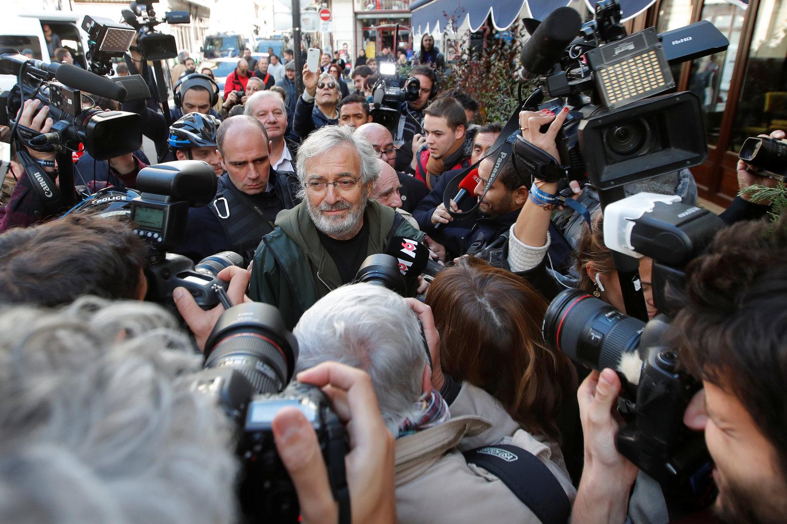 French writer Jean-Paul Dubois arrives after he received the French literary prize Prix Goncourt in Paris