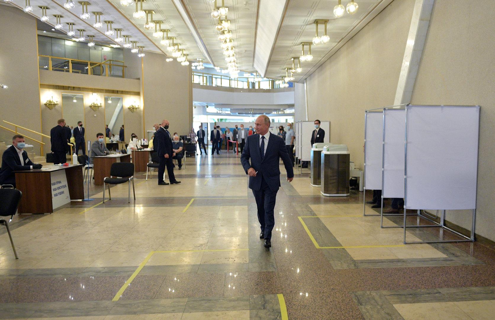 Russian President Putin visits a polling station during a nationwide vote on constitutional reforms in Moscow
