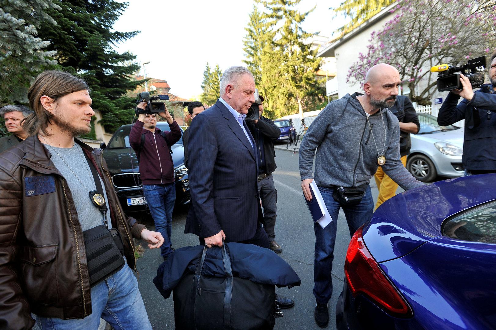 Former Croatian Prime Minister Ivo Sanader is escorted by police in the Remetinec prison, Zagreb