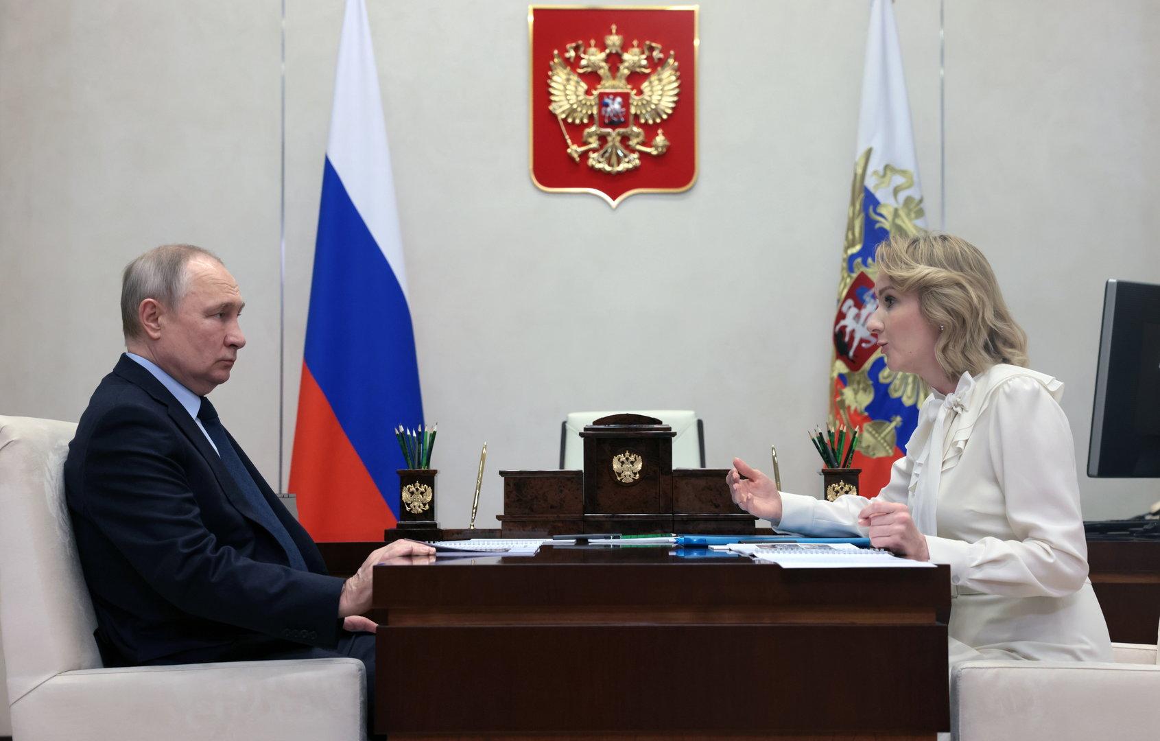 Russian President Vladimir Putin meets with Russian Presidential Commissioner for Children's Rights Maria Lvova-Belova