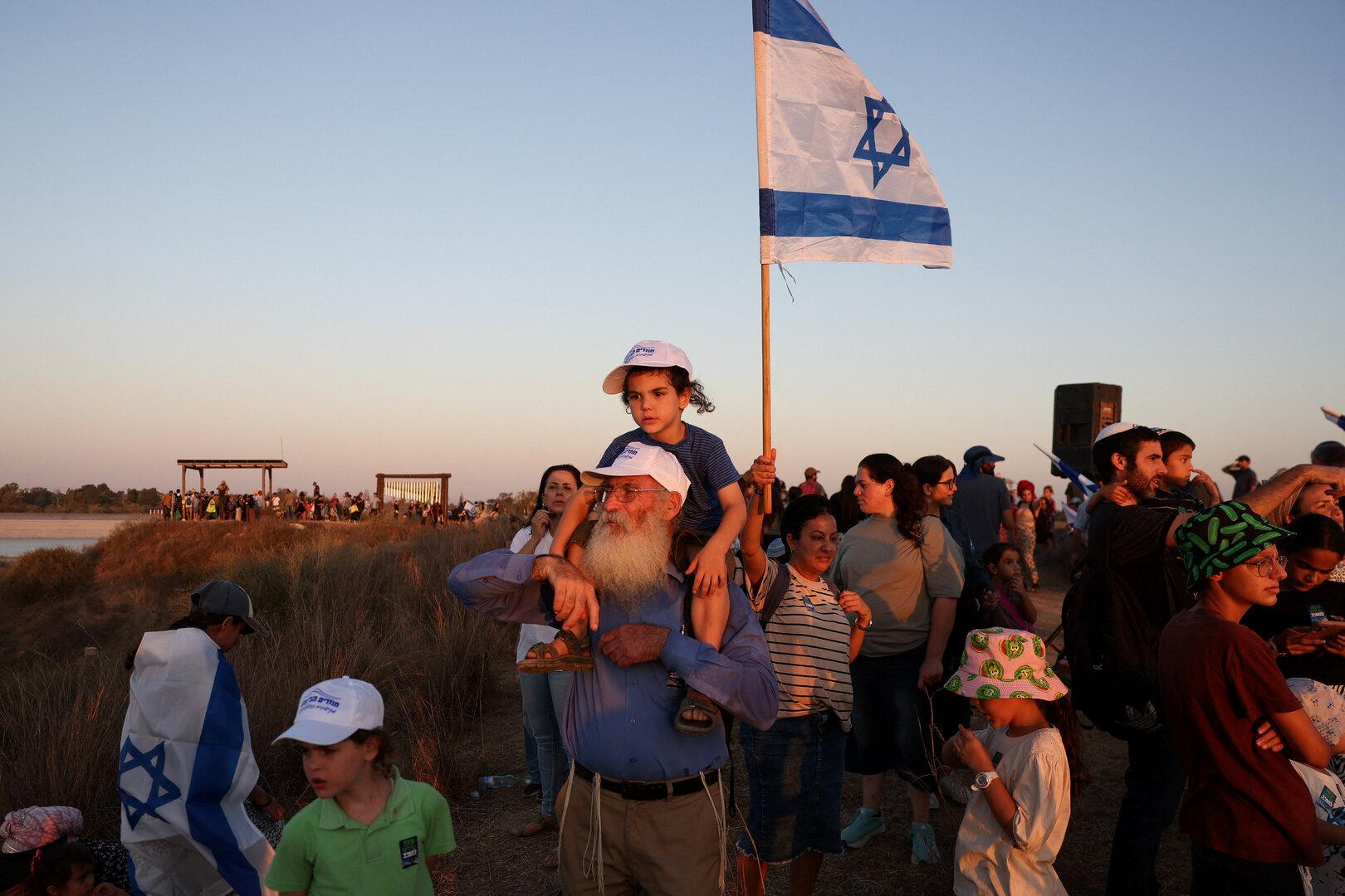 Israeli right wing activists take part in a rally organized by settlers groups to promote Israel's resettling in Gaza Israeli right wing activists take part in a rally organized by settlers groups to promote Israel's resettling in Gaza