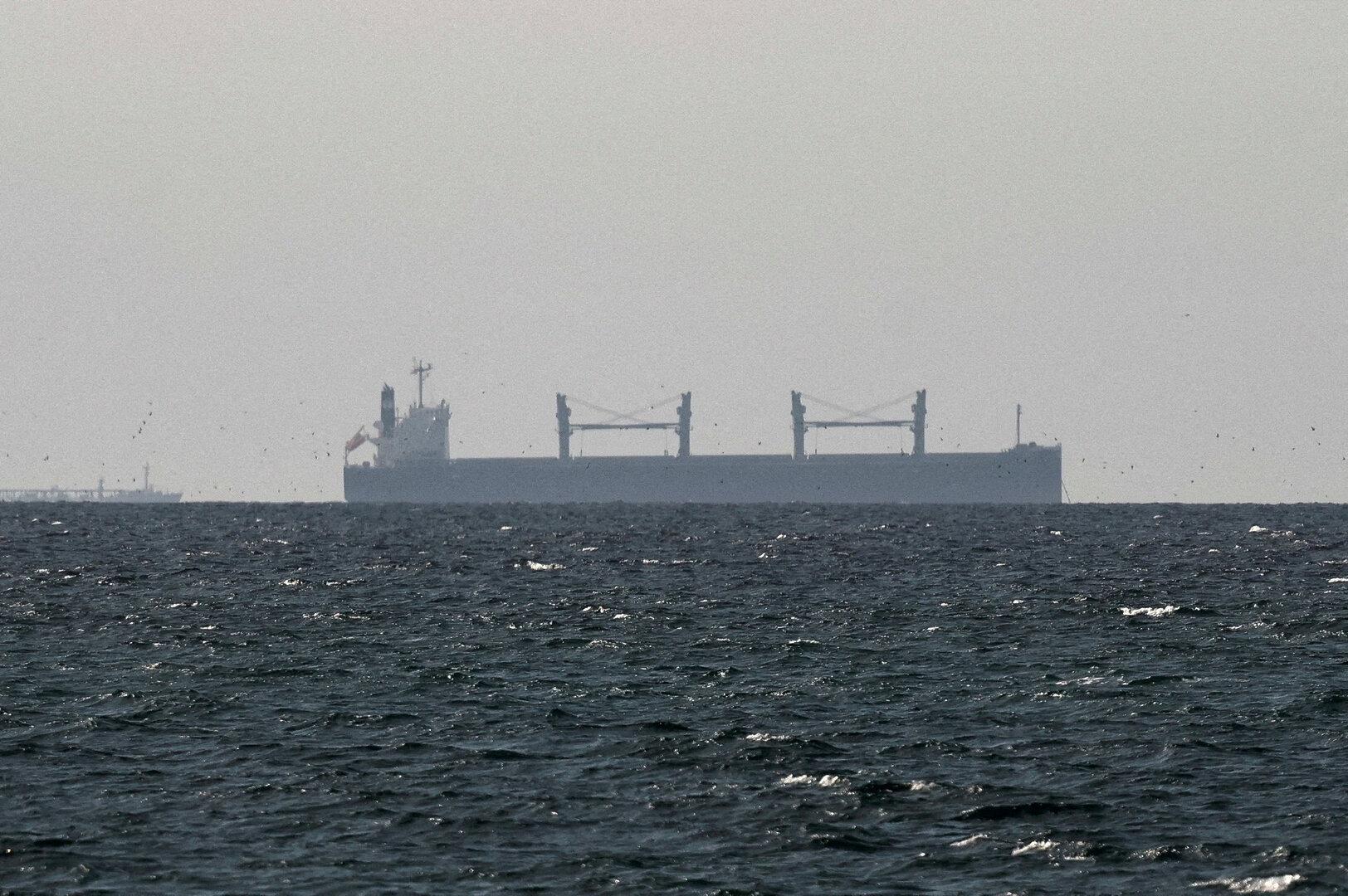 FILE PHOTO: FILE PHOTO: A cargo ship in the Gulf, near the Strait of Hormuz