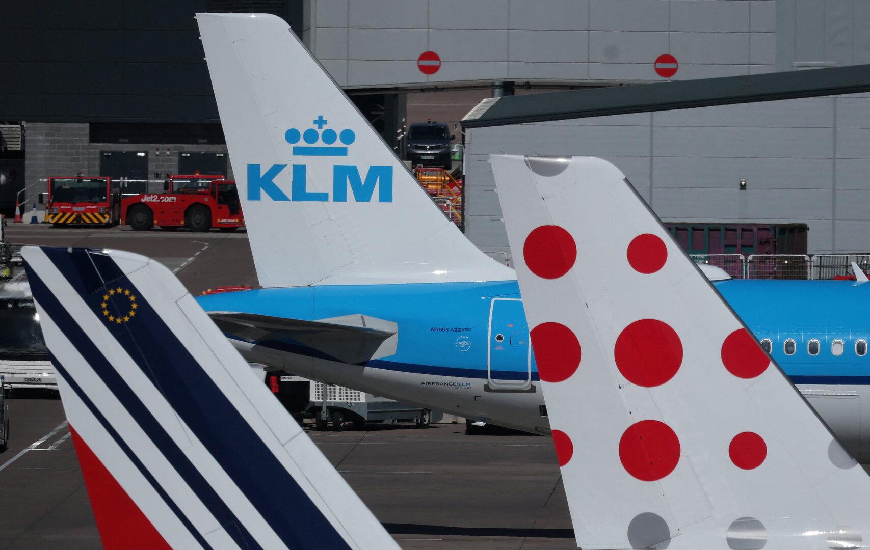 The tails of Air France, KLM and Brussels Airlines planes on the tarmac at Manchester Airport in Manchester